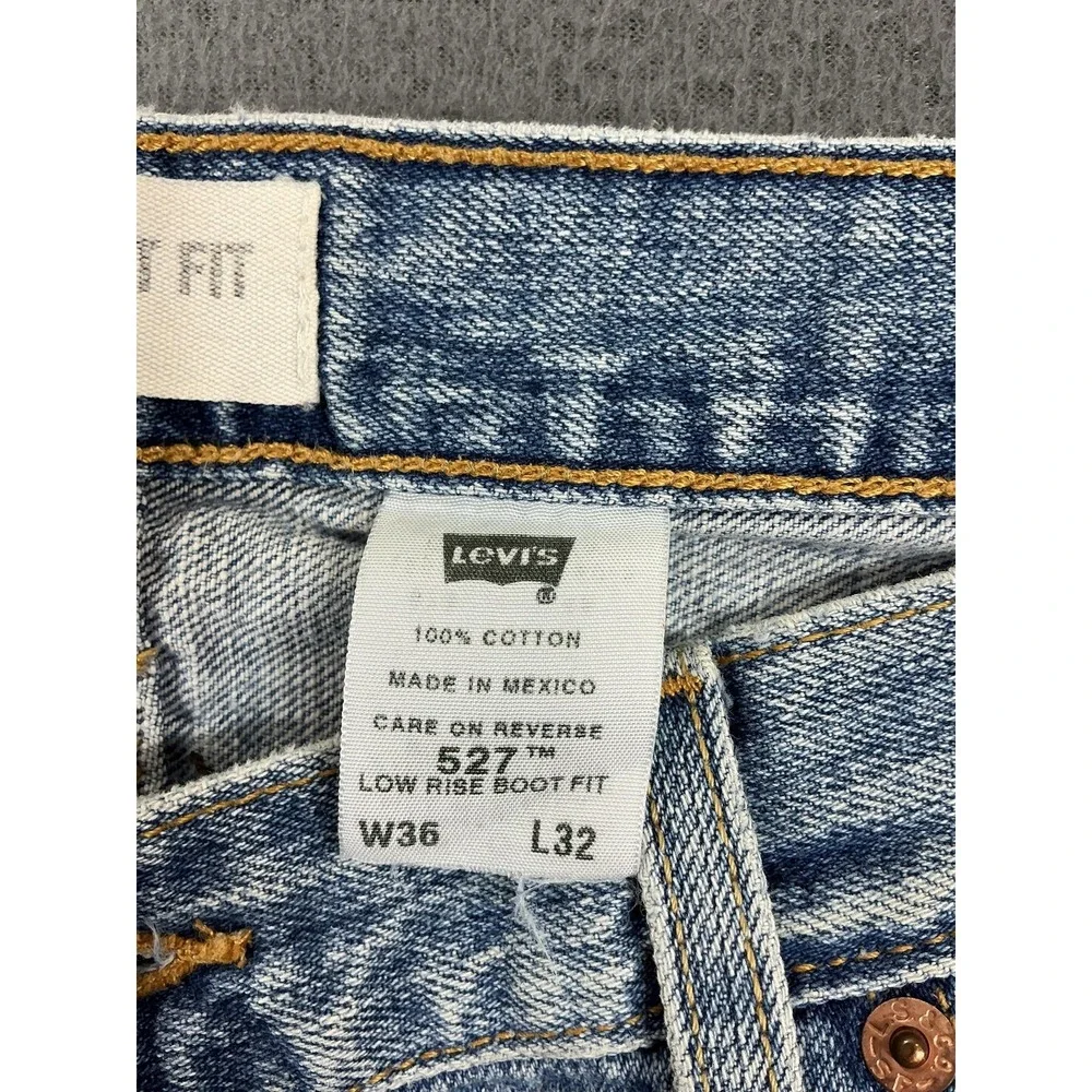 Levi's 527 Jeans Mens 36x32 Light Wash Blue Low Rise Boot Fit Distressed Denim